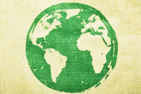 A graphic of the Earth on burlap