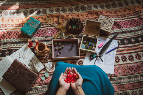 A top=down view of a women with D&D supplies