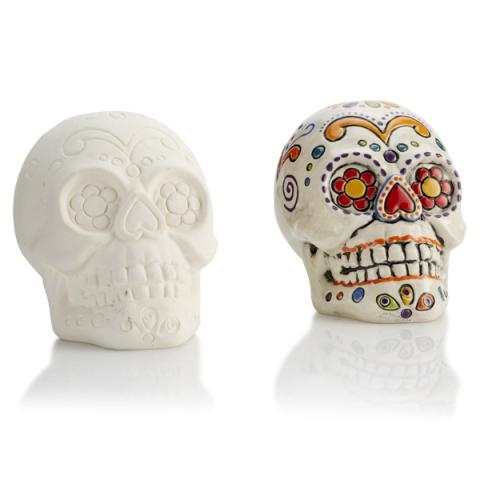 image of ceramic sugar skull on white background