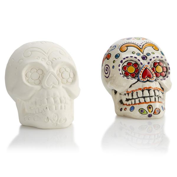 image of ceramic sugar skull on white background